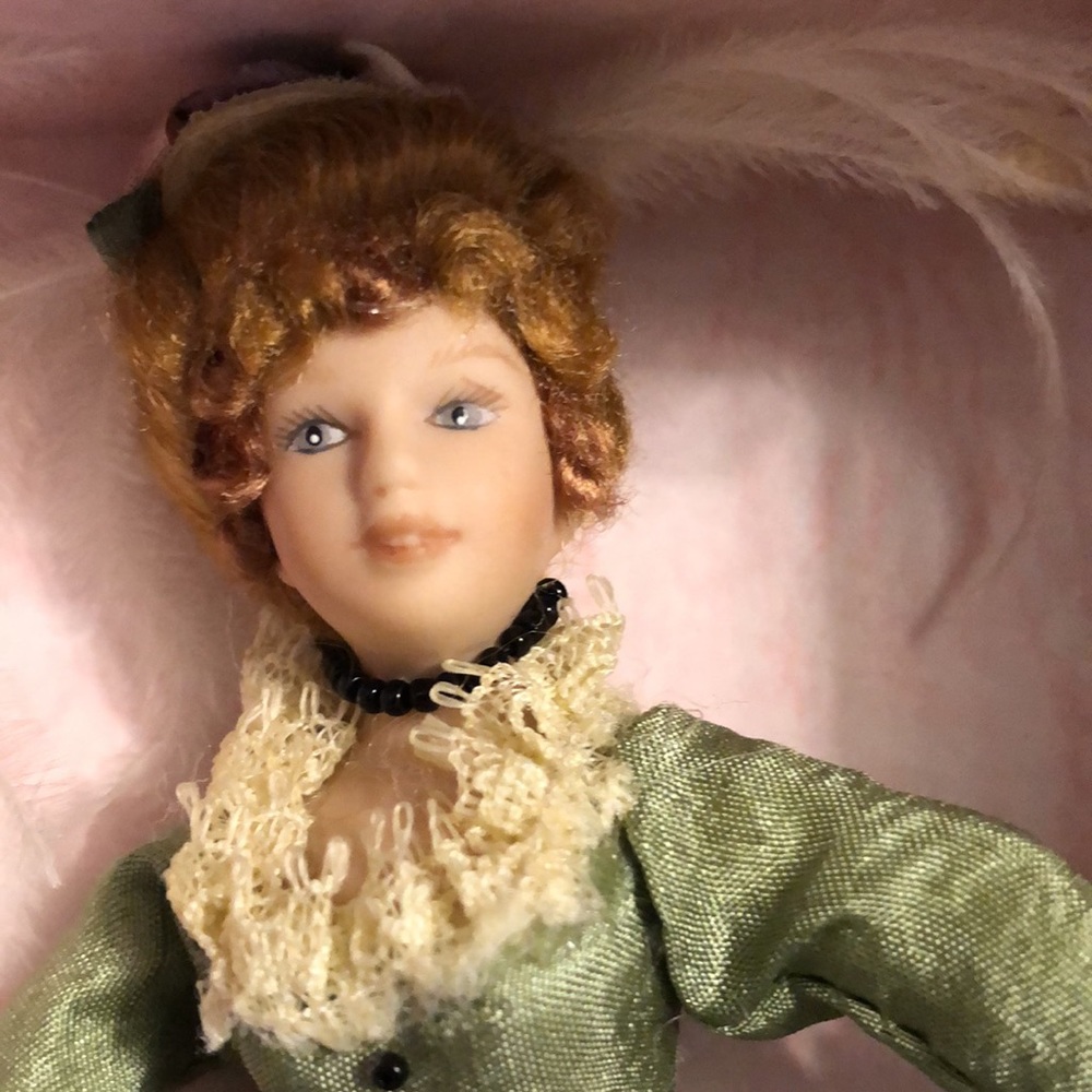 Miniature Victorian Porcelain doll new in box.